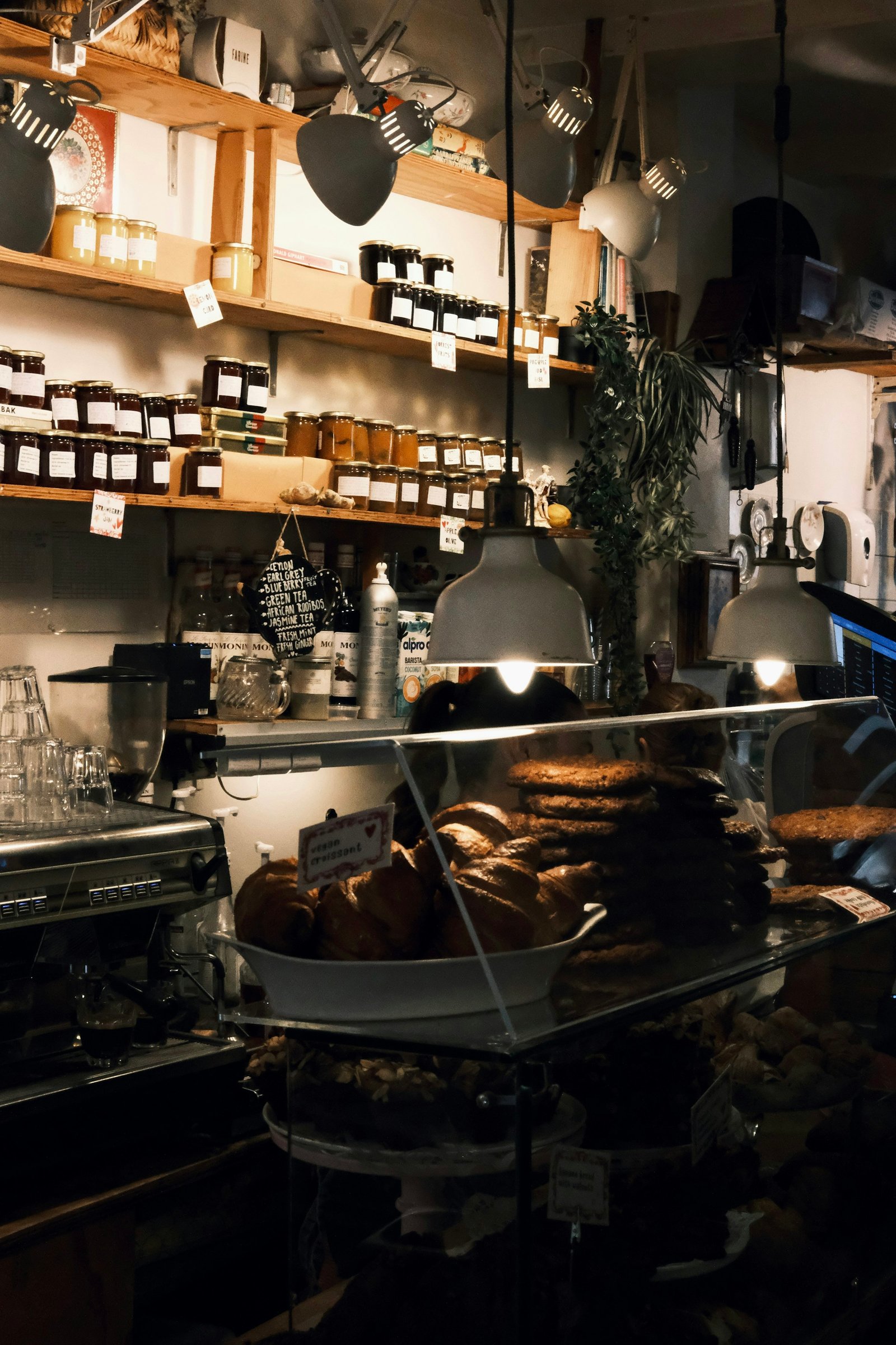 Warm-lit café with pastries